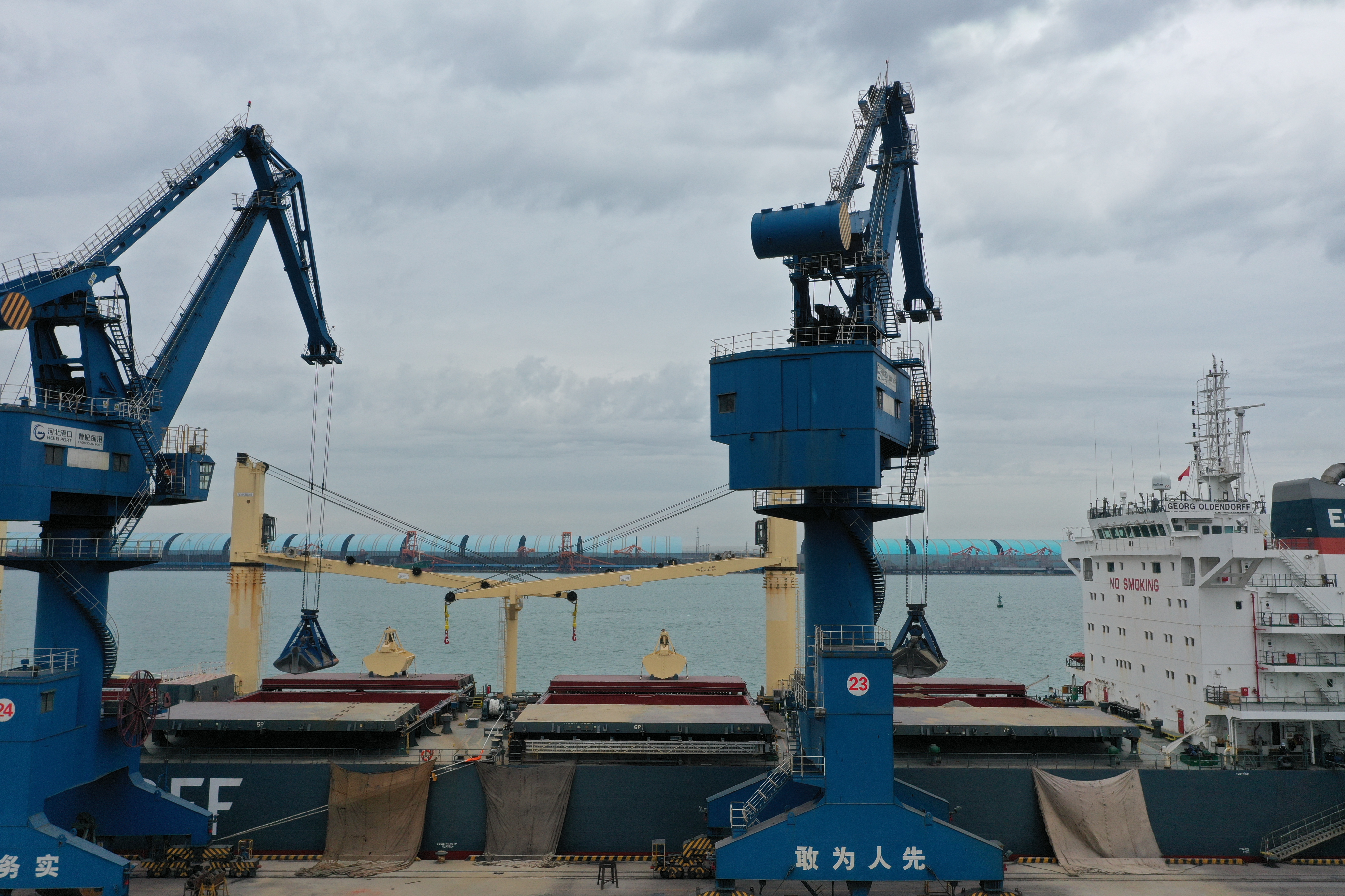 Bulk loading image representing disciplined shipping and dependable cargo execution